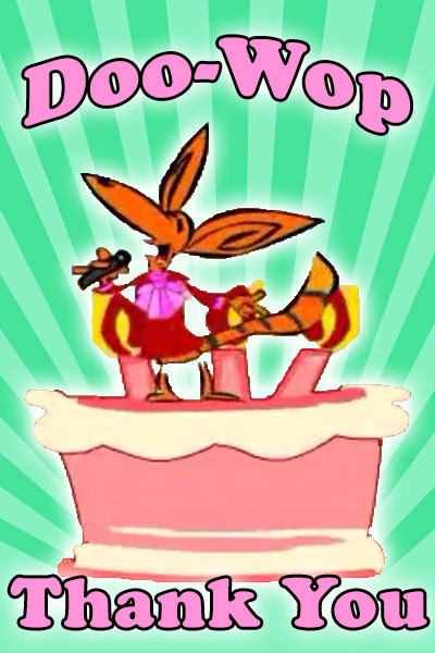 A fox stands on a large cake, singing a song.